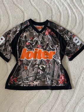 Women’s Camo Sports Jersey with Orange Logo